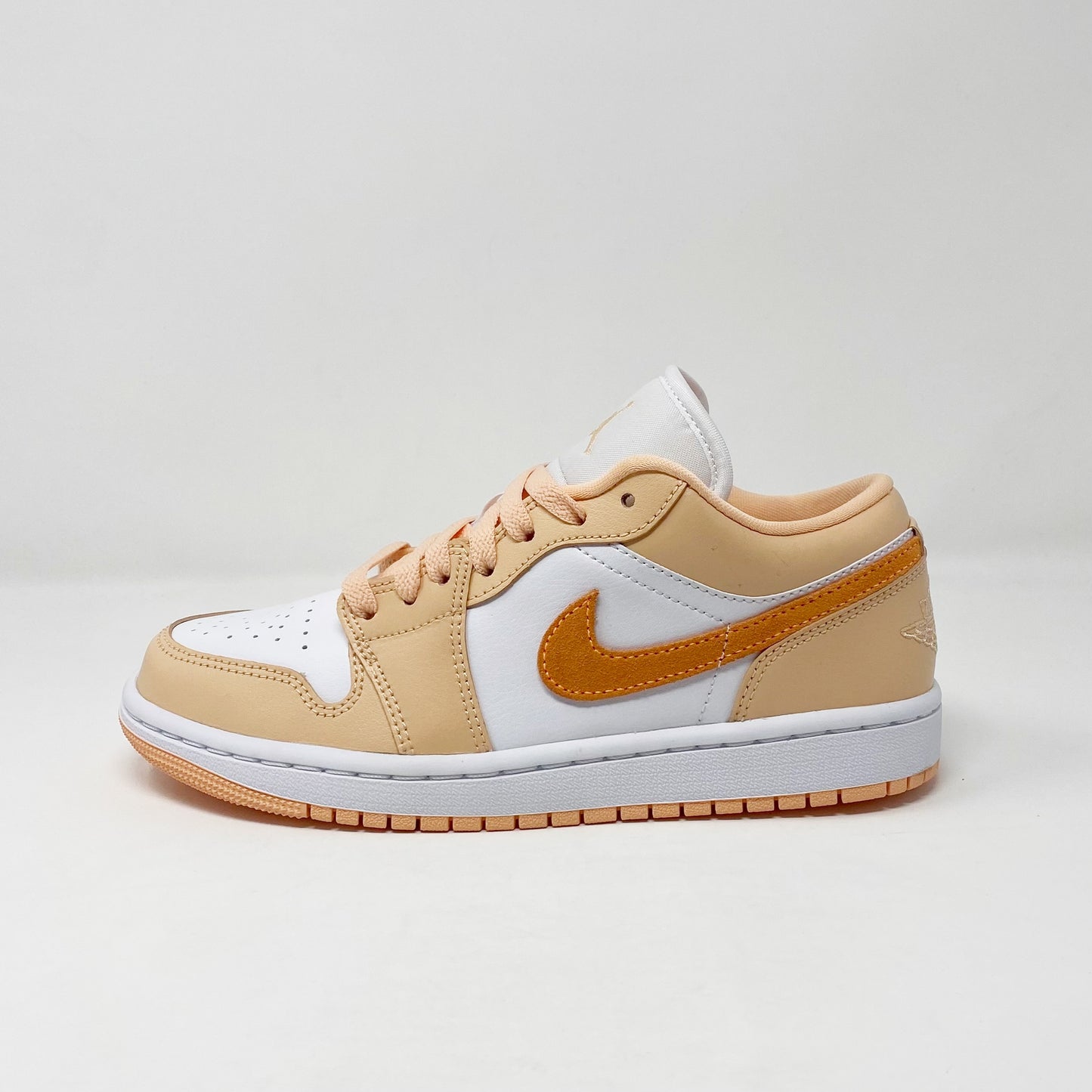 Jordan 1 Low “Sunset Haze” (W)