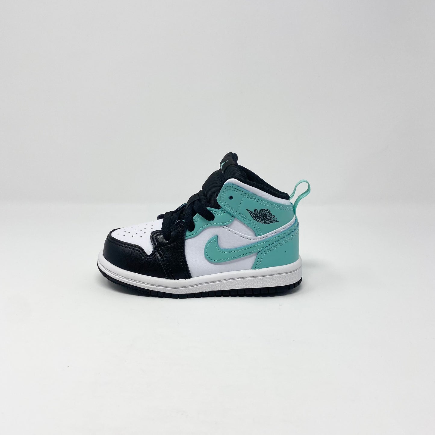 Jordan 1 Mid “Tropical Twist” (TD)