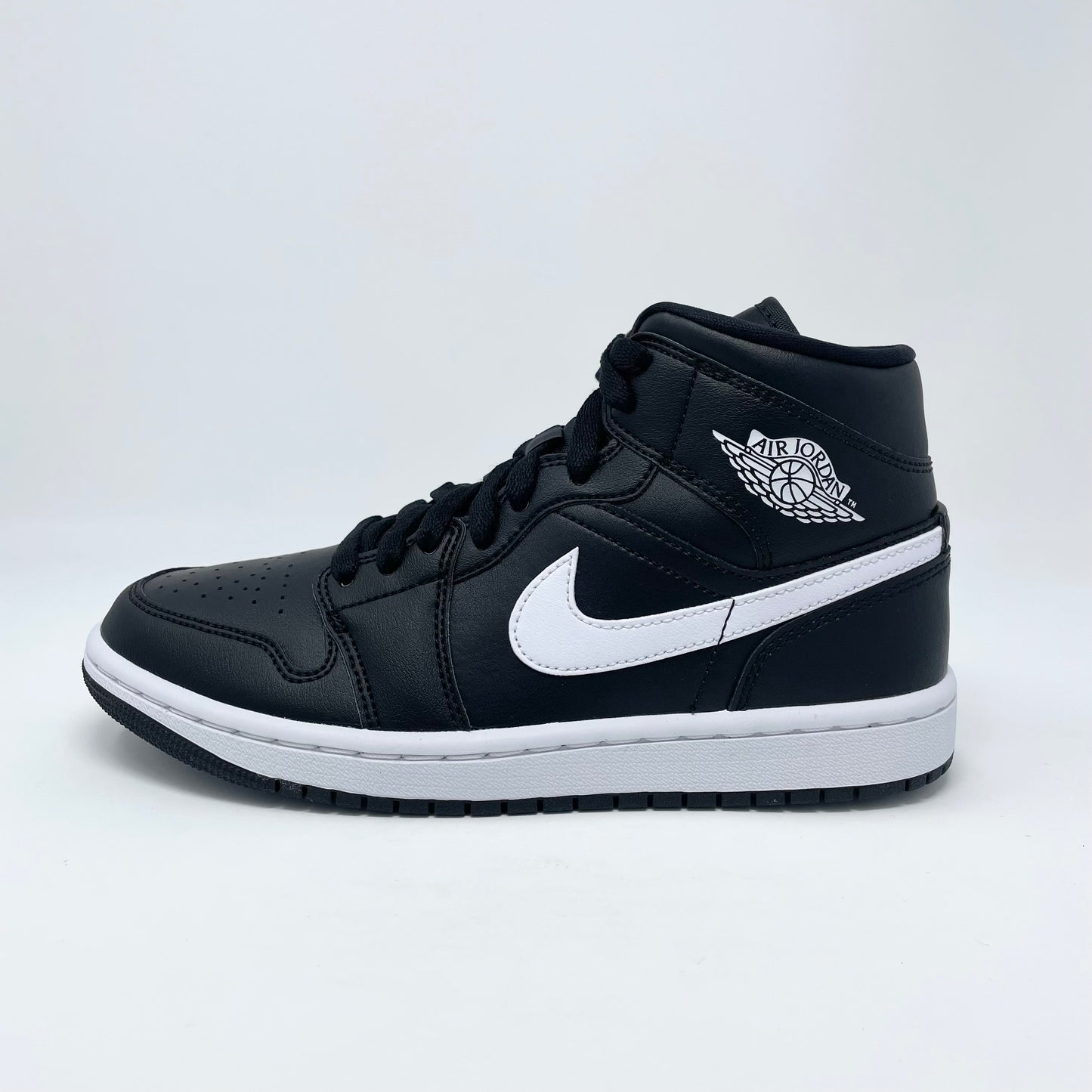 Jordan 1 Mid “Black/White” (W)