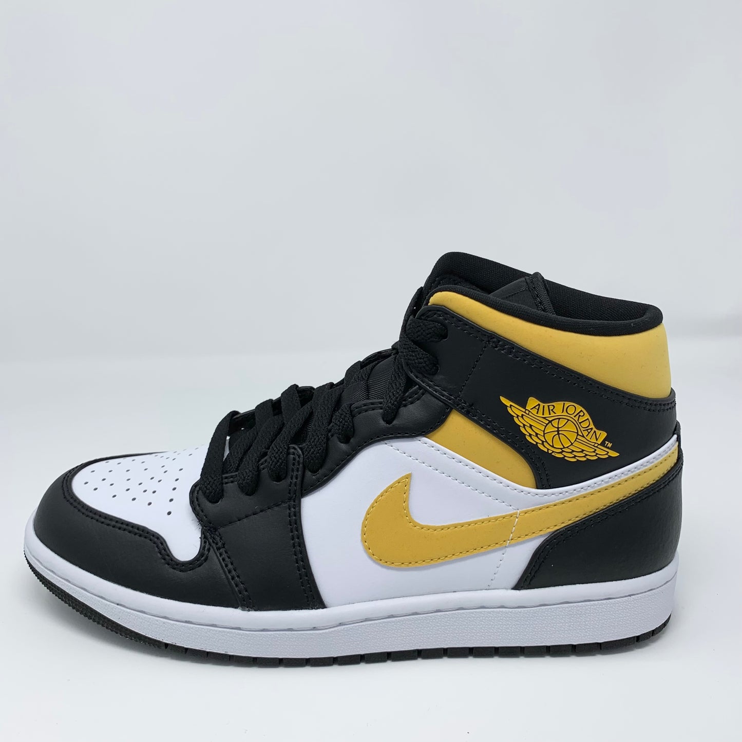 Jordan 1 Mid “Pollen”