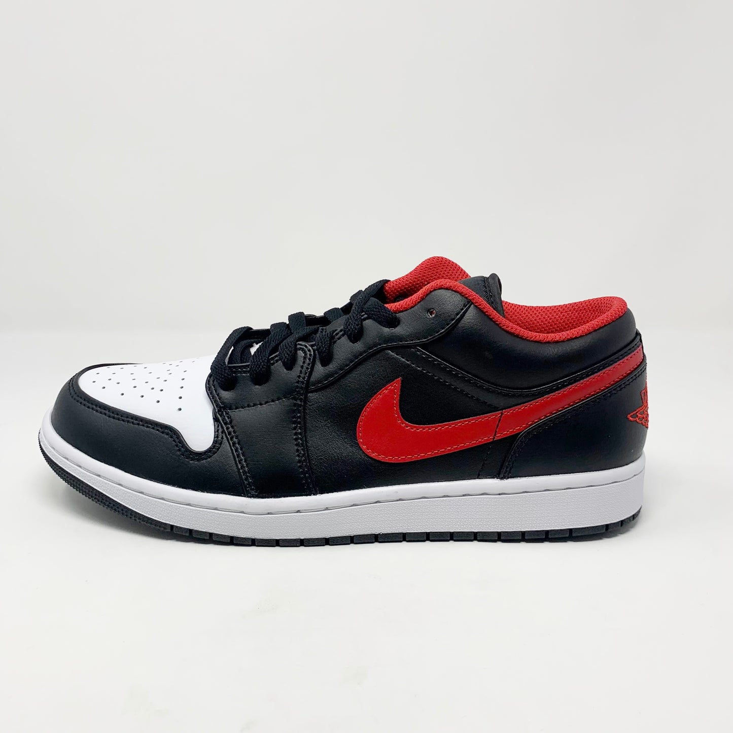 Jordan 1 Low “Fire Red” (GS)