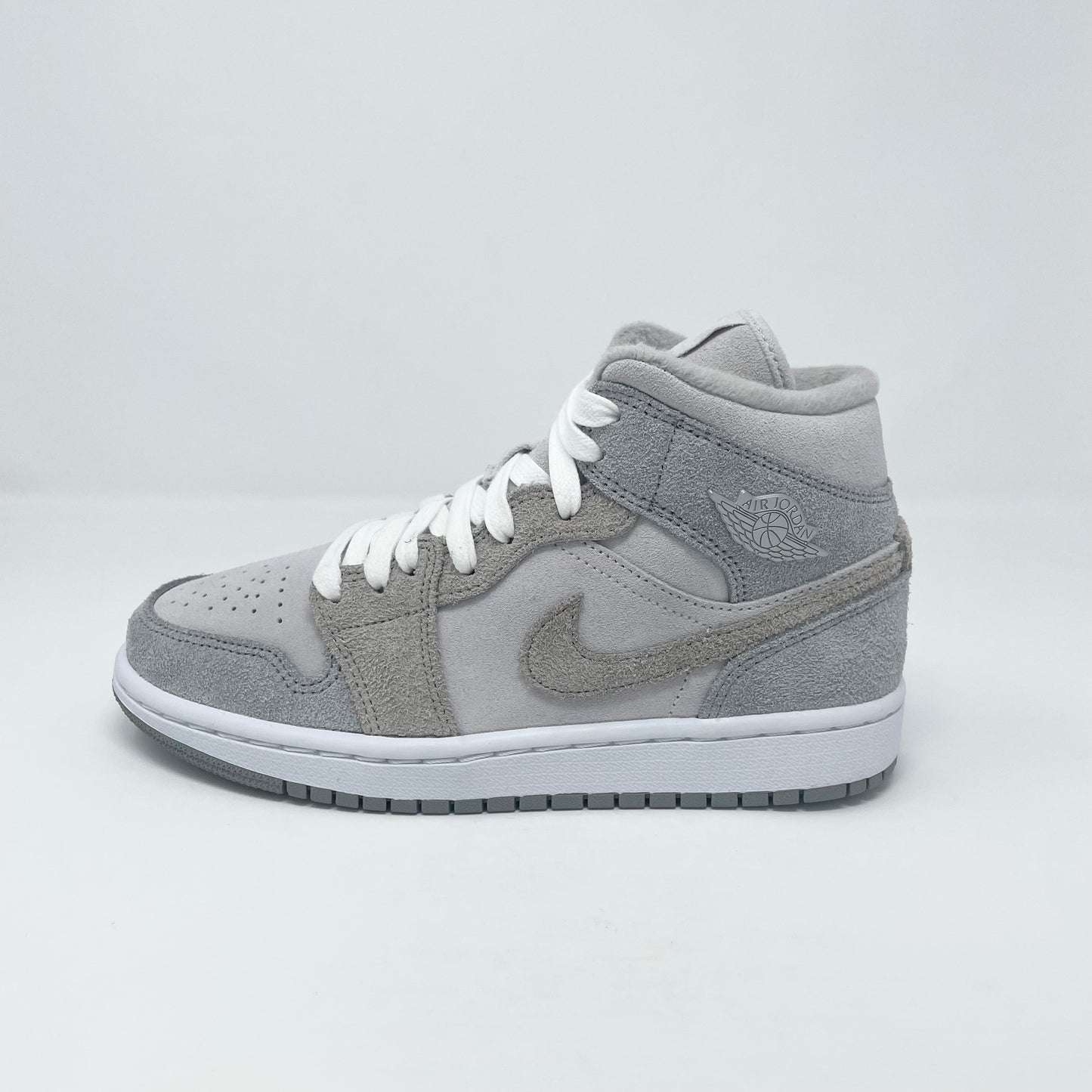 Jordan 1 Mid “Particle Grey” (W)