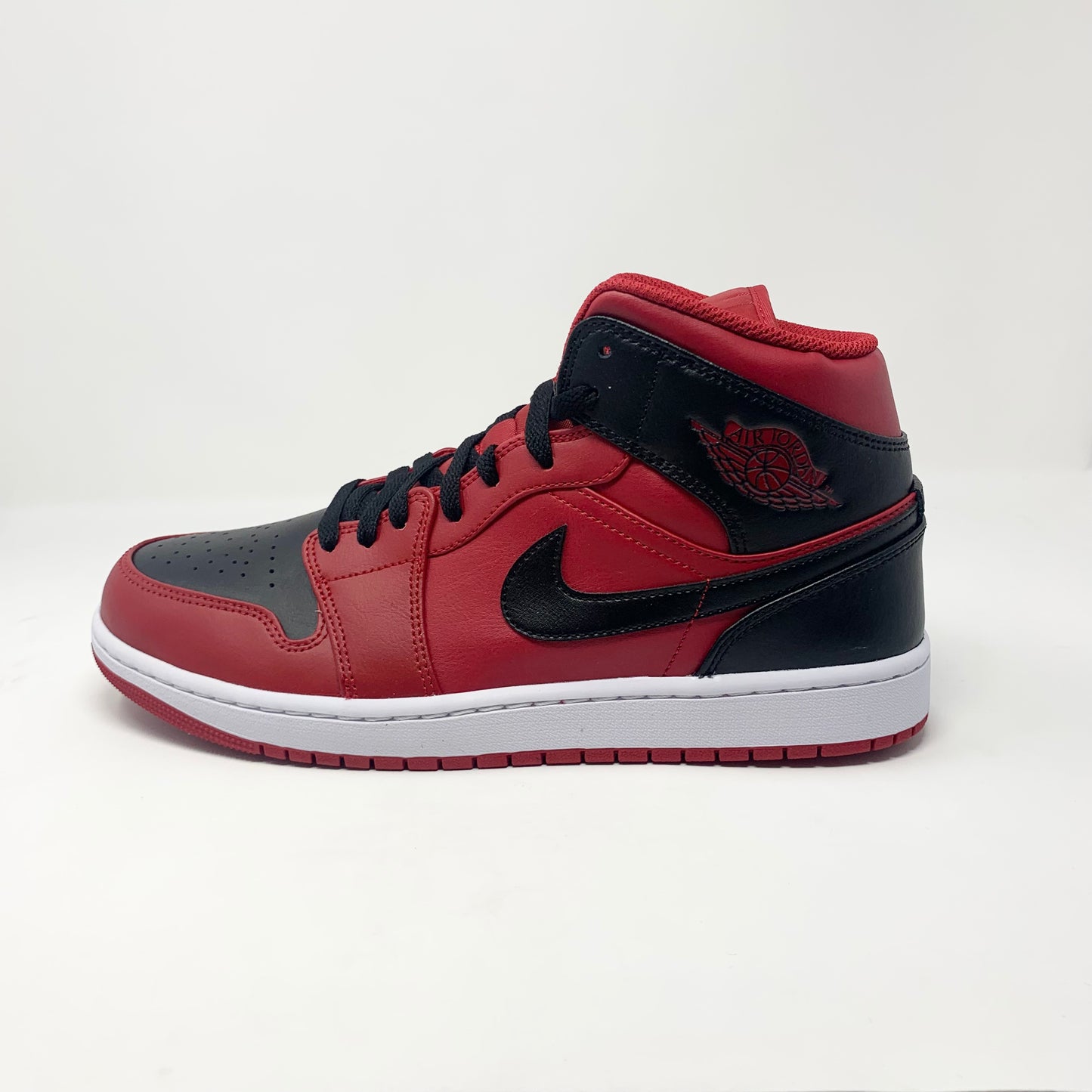 Jordan 1 Mid “Reverse Bred”